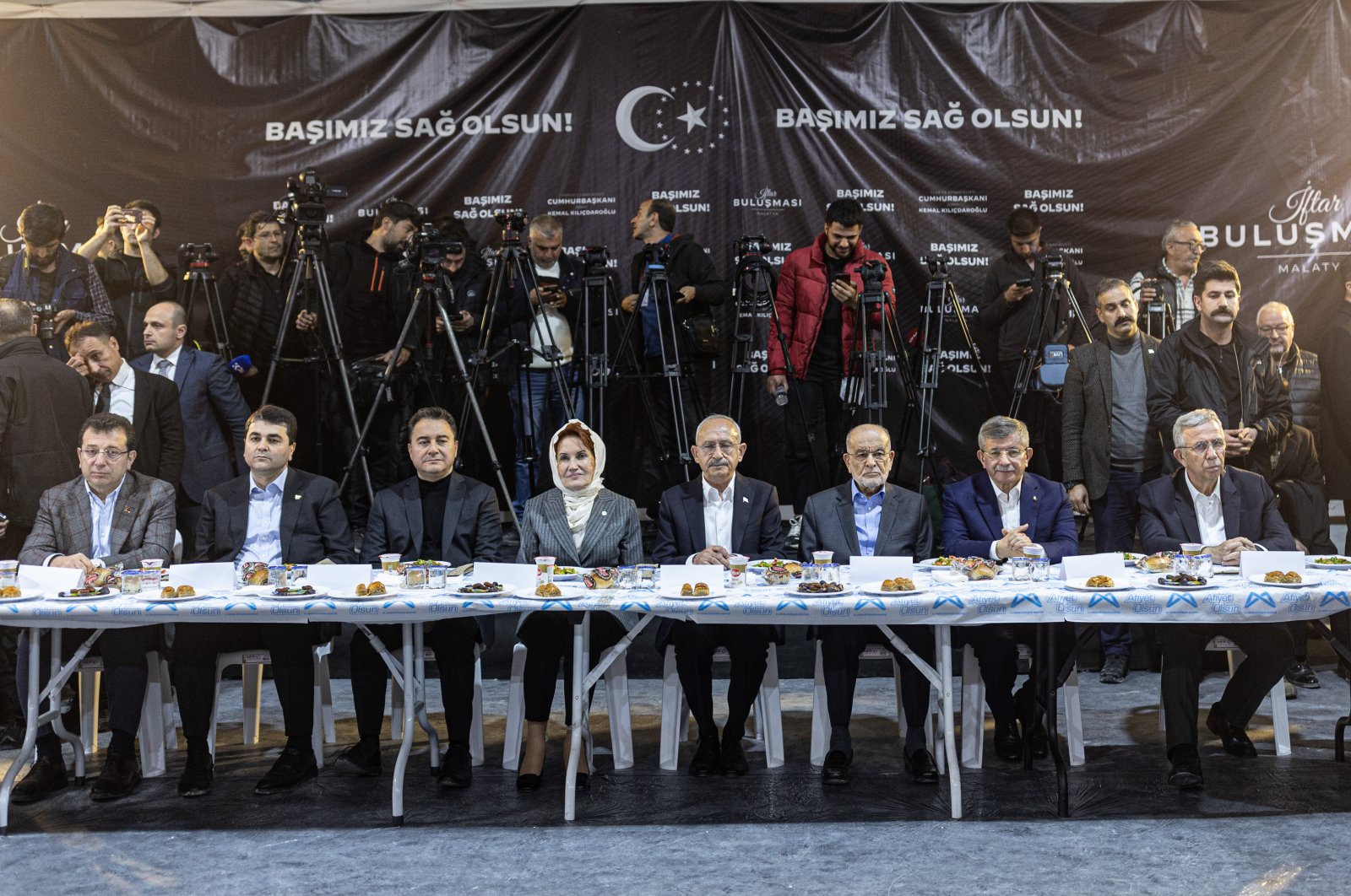 The leaders of the opposition bloc Nation Alliance participate an iftar program with the survivors of the deadly Feb. 6 earthquake, in Malatya, Türkiye, March 24, 2023. (Getty Images Photo)