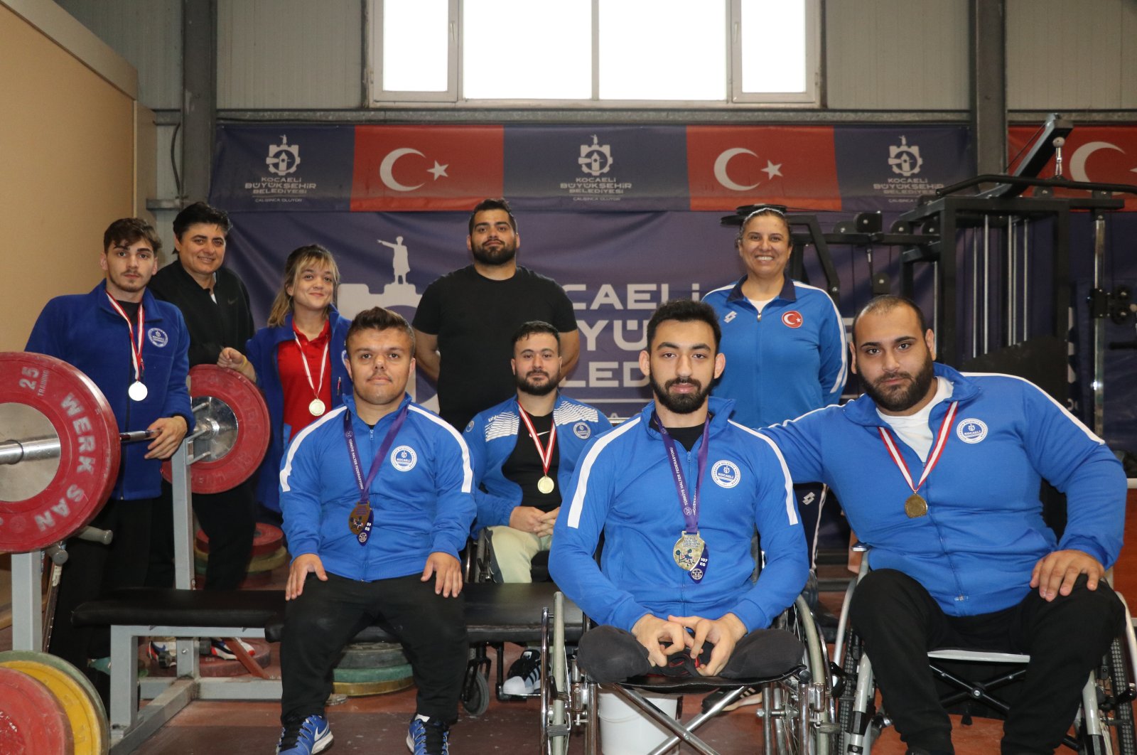 Kocaeli special weightlifters pose for a photo after training at the Kocaeli Metropolitan Municipality, facilities, Kocaeli, Türkiye, March 28, 2023. (AA Photo)