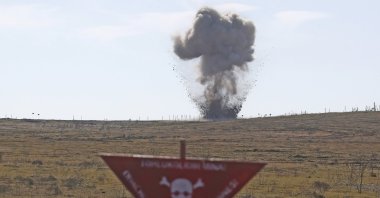 Unexploded ammunition is detonated during a demo mine-clearing operation by the Azerbaijan National Agency for Mine Action (ANAMA) to further operations to clear mines previously planted by Armenian forces, Fuzuli, Azerbaijan, Feb. 27, 2021. (Getty Images)