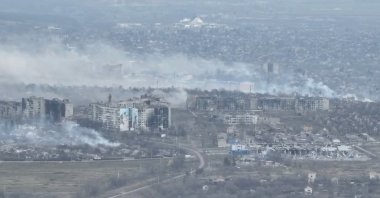An aerial view shows smoke billowing in Bakhmut, Ukraine, April 1, 2023. (Reuters Photo)