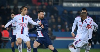 PSG&#039;s Lionel Messi (2nd L) and Lyon&#039;s Maxence Caqueret vie for the ball during the French L1 football match at the Parc des Princes Stadium, Paris, France, April 2, 2023. (AFP Photo)