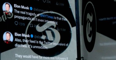 The profile image of The New York Times Twitter account is reflected in tweets by Twitter CEO Elon Musk, in Washington, D.C., U.S., April 2, 2023. (AFP Photo)