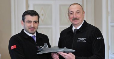 Azerbaijani President Ilham Aliyev (R) and Baykar head and CTO Selçuk Bayraktar during a visit by Bayraktar, Baku, Azerbaijan, April 3, 2023. (AA Photo)