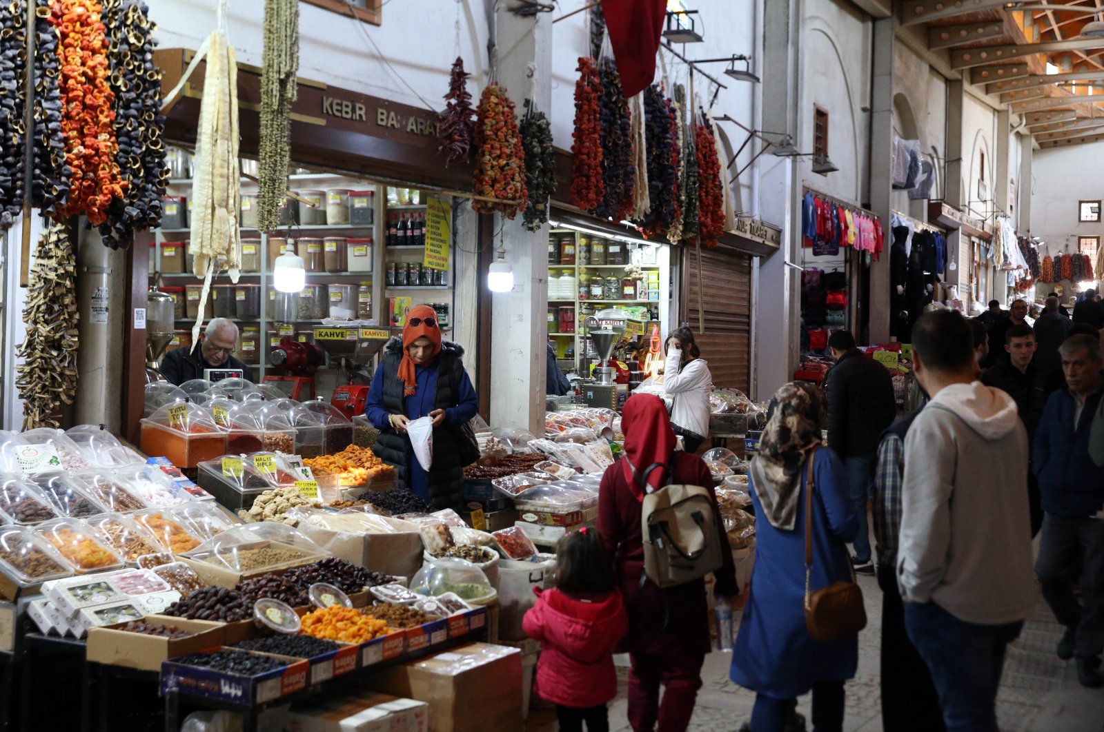 People are seen at a local bazaar in Kahramanmaraş, southern Türkiye, March 27, 2023. (AA Photo)