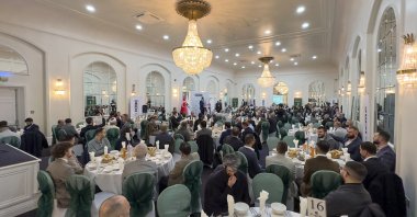 Members of Turkish community in London are photographed during fast-breaking (iftar) dinner event organized by ICMG U.K., London, U.K., April 3, 2023. (AA Photo)