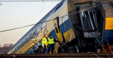 Emergency services work at the site of a derailed night train in Voorschoten, the Netherlands, April 4, 2023. (AFP Photo)