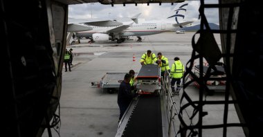 Hospital beds and aid material, provided by the Greek Ministry of Civil Protection, are loaded on a plane, following the deadly earthquake in Türkiye, at the Eleftherios Venizelos International Airport of Athens, Greece, Feb. 9, 2023. (REUTERS Photo)