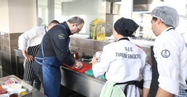 International chefs training impaired chefs on world cuisine at the Dokuz Eylül University, İzmir, Türkiye, April 4, 2023. (IHA Photo)