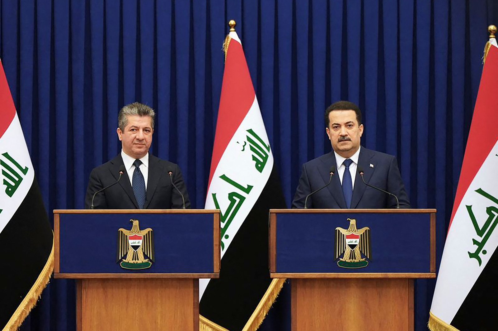 Iraqi Prime Minister Mohammed Shia Al Sudani (R) and Kurdistan Regional Government (KRG) Prime Minister Masrour Barzani hold a joint news conference in Baghdad, Iraq, April 4, 2023. (AFP Photo)