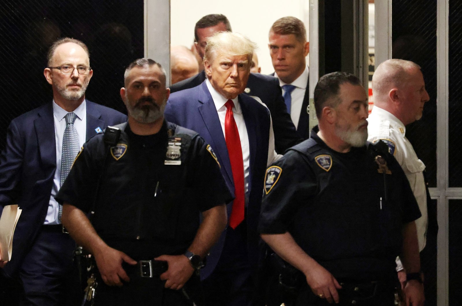 Former U.S. President Donald J. Trump walks toward the courtroom inside New York Criminal Court in New York, U.S., April 4, 2023. (EPA Photo)