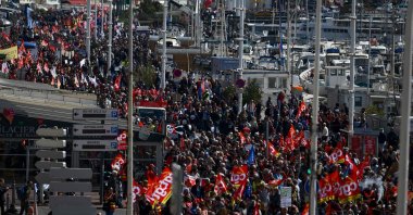 Demonstrators take part in the 11th nation day of action, after the government pushed a pensions reform through Parliament without a vote, using article 49.3 of the constitution, in Marseille, southeastern France, April 6, 2023. (AFP Photo)