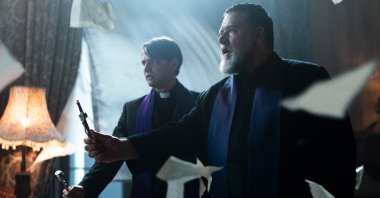 This image released by Sony Pictures shows Daniel Zovatto (L) and Russell Crowe in a scene from Screen Gems&#039; &quot;The Pope&#039;s Exorcist.&quot; (AP Photo)