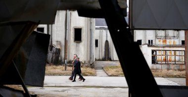Harm Hiddink, a former member of a Dutch battalion serving with the U.N. peacekeepers, walks through a destroyed factory and former U.N. safe base in Potocari near Srebrenica, Bosnia-Herzegovina, Feb. 9, 2017. (Reuters File Photo)