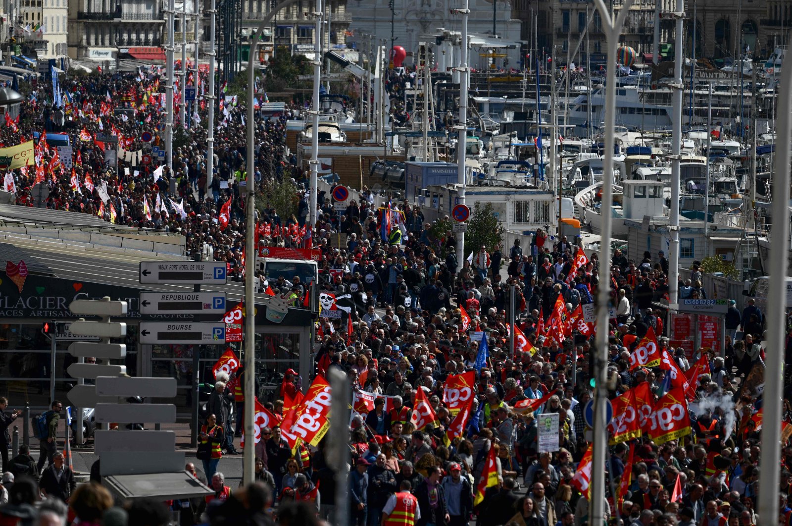 Demonstrators take part in the 11th nation day of action, after the government pushed a pensions reform through Parliament without a vote, using article 49.3 of the constitution, in Marseille, southeastern France, April 6, 2023. (AFP Photo)