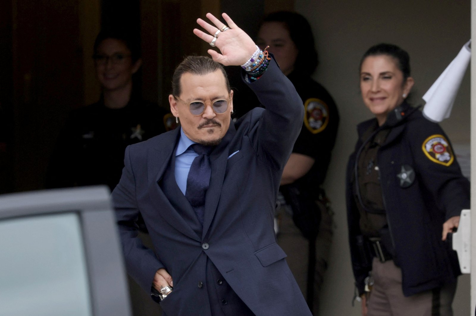 Actor Johnny Depp gestures as he leaves the Fairfax County Circuit Courthouse following his defamation trial against his ex-wife Amber Heard, in Fairfax, Virginia, U.S., May 27, 2022. (Reuters Photo)