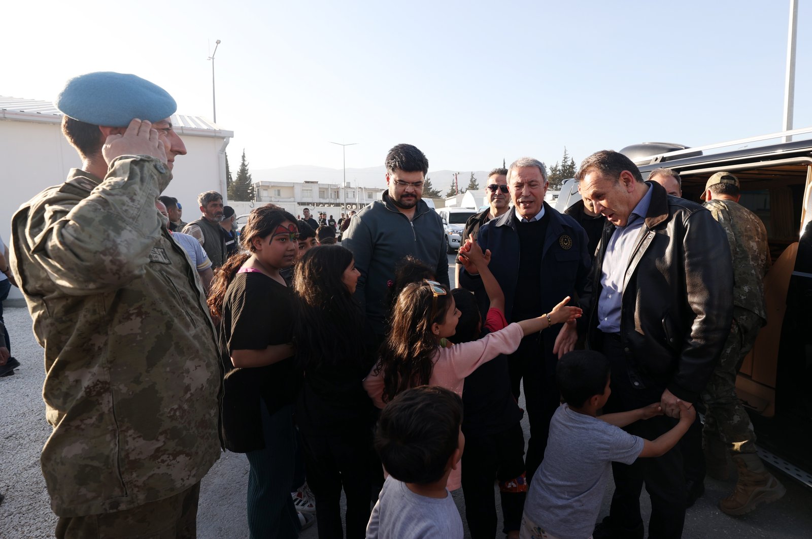 Defense Minister Hulusi Akar and his Greek counterpart Nikos Panagiotopoulos visit a container city in the earthquake-stricken Hatay province, Türkiye, April 4, 2023. (AA Photo)