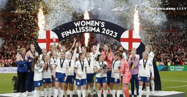 England players celebrate with the trophy after winning the Women's Finalissima at the Wembley Stadium, London, UK., April 6, 2023. (Reuters Photo)
