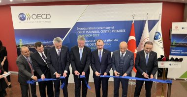 The official inauguration of the Istanbul Center of the Organisation for Economic Co-operation and Development (OECD) took place with the ribbon-cutting ceremony of Turkish Trade Minister Mehmet Muş (C-R) and OECD Secretary-General Mathias Cormann (C-L), Istanbul, Türkiye, March 29, 2023. (IHA Photo)