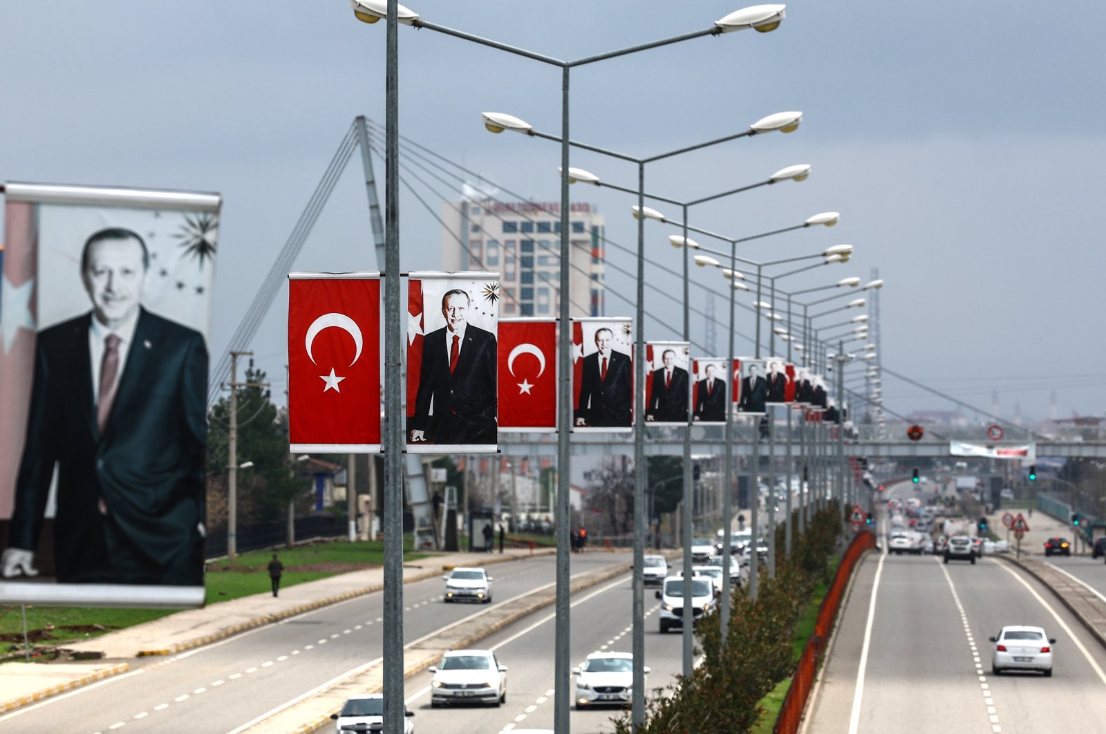 Pictures of Turkish President Recep Tayyip Erdoğan hang on the highway as the presidential elections near, in Diyarbakır, Türkiye, March 20, 2023. (EPA Photo)