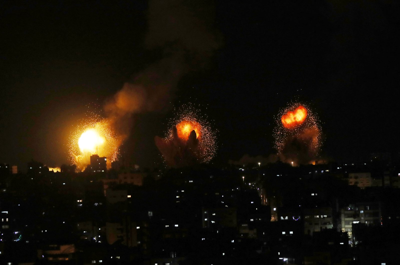 Explosions from Israeli airstrikes are seen in the blockaded Gaza Strip, Palestine, April 7, 2023. (AA Photo)