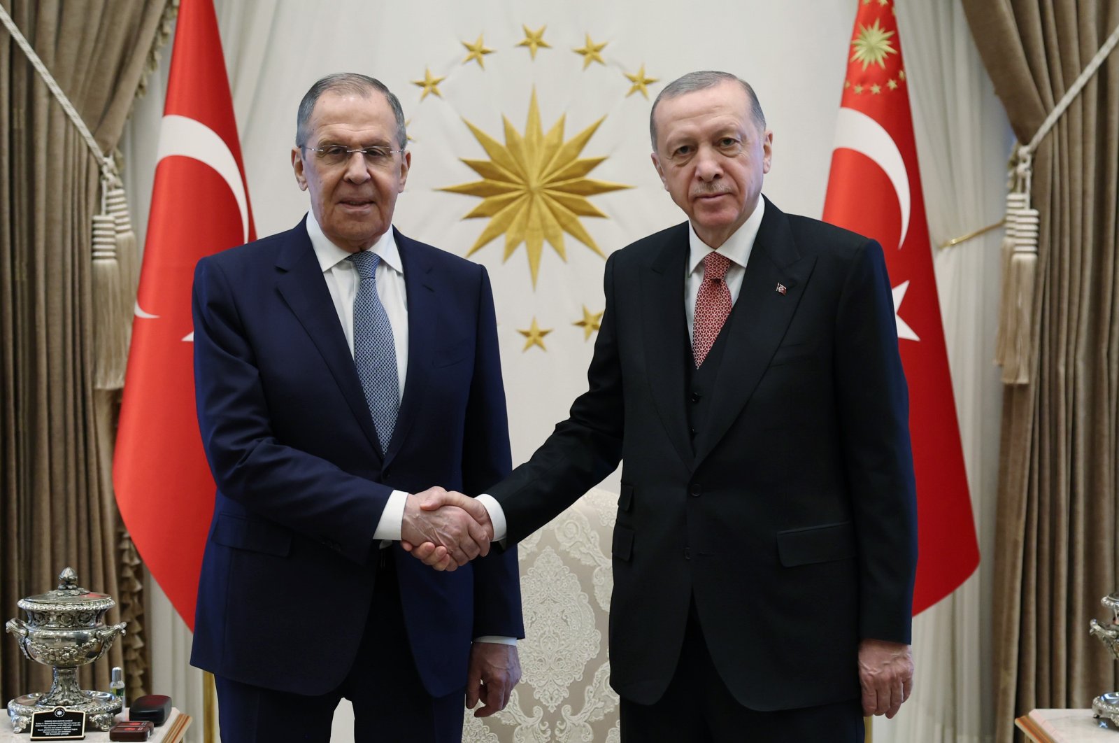 President Recep Tayyip Erdoğan (R) shakes hands with Russian Foreign Minister Sergey Lavrov during talks in Ankara, Türkiye, April 7, 2023. (AA Photo)
