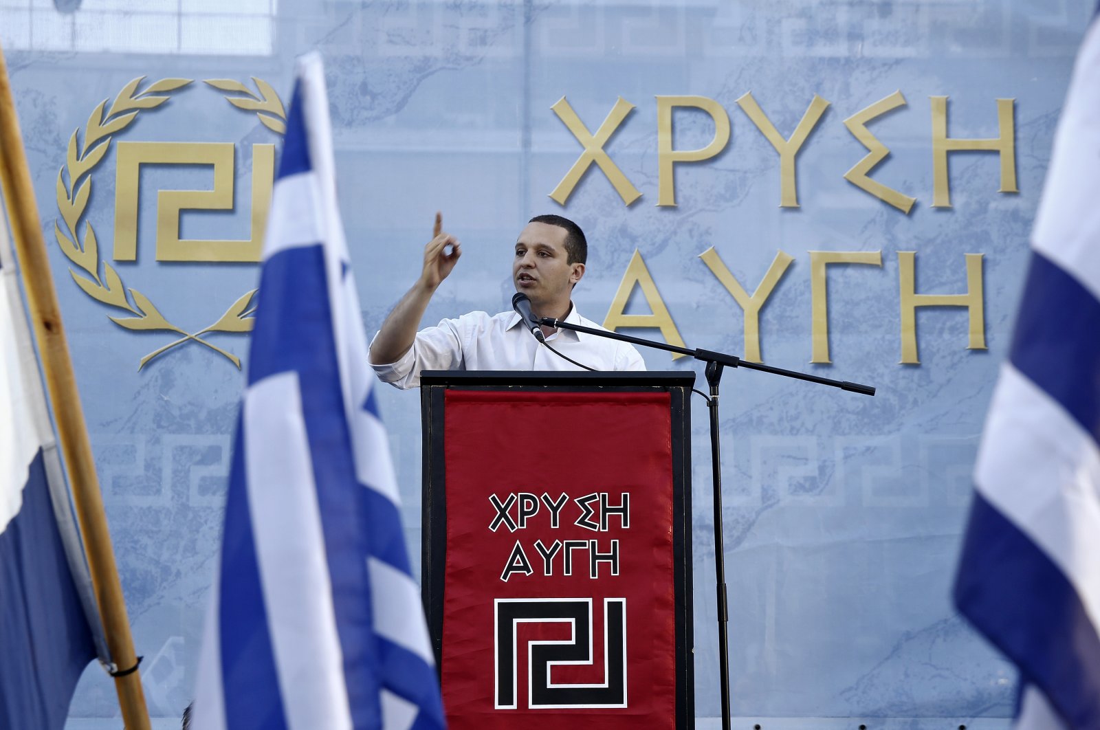 Far-right Golden Dawn party lawmaker Ilias Kasidiaris delivers a speech during a pre-election rally in Athens, May 23, 2014. (Reuters Photo)