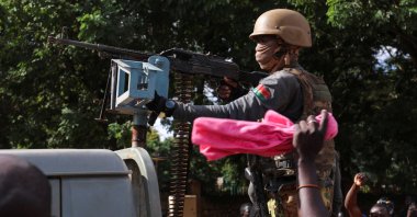 Soldiers stand guard in an armored vehicle in Ouagadougou, Burkina Faso, Oct. 2, 2022. (Reuters Photo)