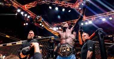 Israel Adesanya celebrates after knocking out Alex Pereira during their Middleweight fight in Miami, Florida, April 08, 2023. (AFP Photo)