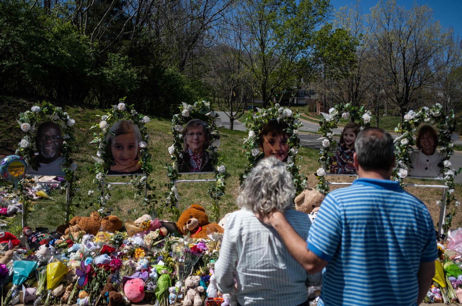 People visit a makeshift memorial at the entrance of The Covenant School in Nashville, Tennessee, U.S., April 1, 2023. (AFP Photo)