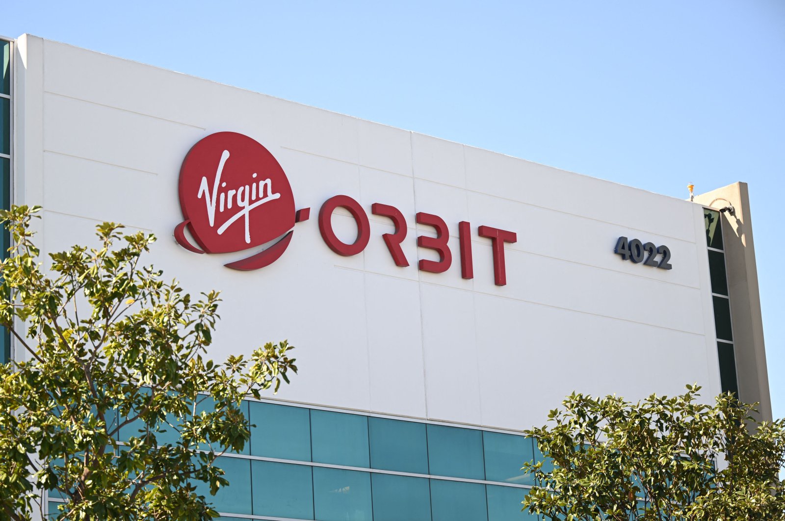Virgin Orbit signage is displayed outside the company&#039;s headquarters in Long Beach, California, U.S., April 4, 2023. (AFP Photo)