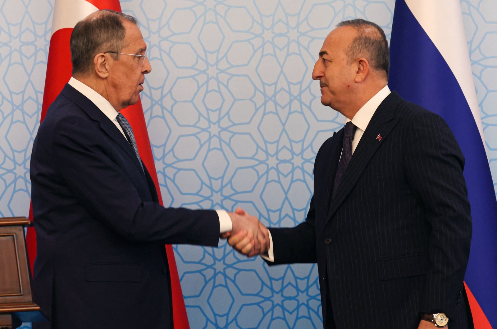 Foreign Minister Mevlüt Çavuşoğlu (R) shakes hands with his Russian counterpart Sergey Lavrov following their joint news conference following talks in Ankara, Türkiye, April 7, 2023. (AFP Photo)