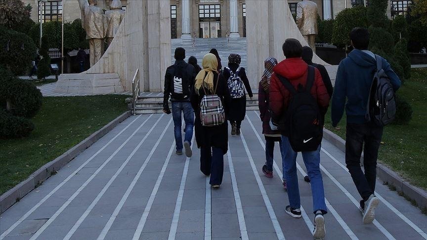 Students walk in front of Yıldırım Beyazıt University, Ankara, Türkiye, April 9, 2023. (AA Photo)