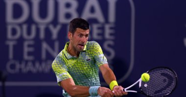 Novak Djokovic in action against Daniil Medvedev in the men&#039;s singles semifinal match during Day 13 of the Dubai Open at Dubai Duty Free Tennis Stadium, Dubai, UAE, March 3, 2023. (Getty Images Photo)