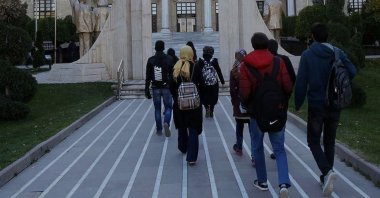 Students walk in front of Yıldırım Beyazıt University, Ankara, Türkiye, April 9, 2023. (AA Photo)