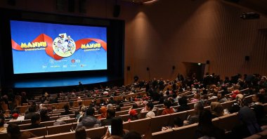 Audiences prepare to watch &quot;Mannu in Çanakkale&quot; at the Atatürk Cultural Center, in Istanbul, Türkiye, April 9, 2023. (AA Photo)