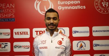 Türkiye gymnast Ferhat Arıcan poses for a photo after an interview, Antalya, Türkiye, April 10, 2023. (AA Photo)