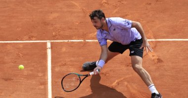Switzerland&#039;s Stanislas Wawrinka plays a righthand return to Netherland&#039;s Tallon Griekspoor during their Monte-Carlo ATP Masters Series tournament round of 64 tennis match, Monte Carlo, Monaco, April 10, 2023. (AFP Photo)