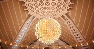 Noor ul Islam, the muezzin responsible for performing the Islamic call to prayer, known as the adhan, performs Maghrib Adhan at the grand Faisal Mosque during the Muslim holy fasting month of Ramadan in Islamabad, Pakistan, March 29, 2023. (AFP Photo)