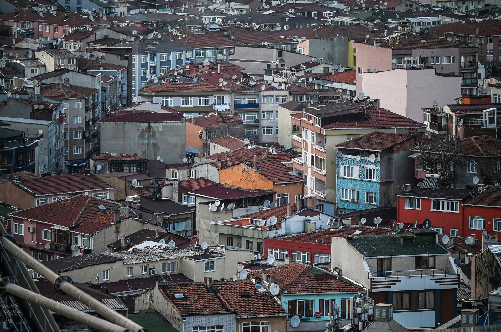A side photograph shows old buildings at the Kasımpaşa district in Istanbul, Türkiye, March 15, 2023. (AFP Photo)