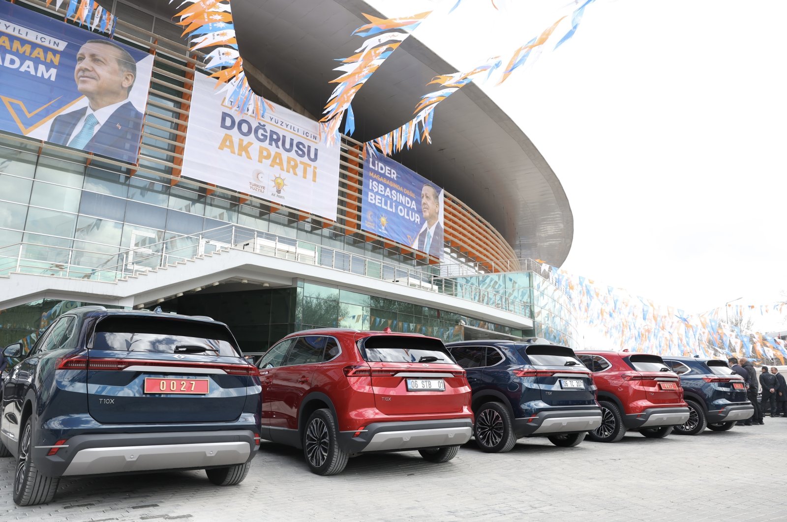 Togg T10Xs, SUV models of Türkiye&#039;s first domestic car brand, that belong to Cabinet members are seen outside the Ankara Sports Hall, in the capital Ankara, Türkiye, April 11, 2023. (AA Photo)
