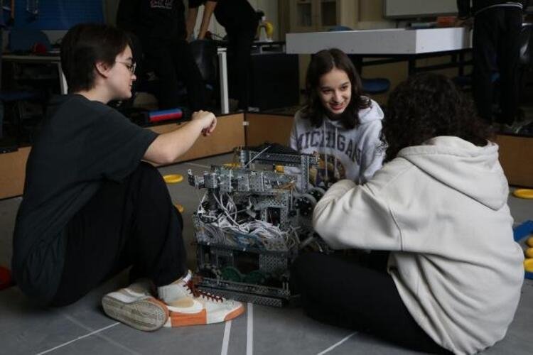 Members of the robotic team from Ebru Nayim Science High School work on the robot they are set to compete with at the Vex Robotic Competition in the U.S., in Tekirdağ, northwestern Türkiye, April 12, 2023. (DHA Photo)