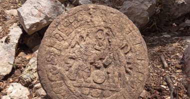 Mexican archaeologists found a circular-shaped Mayan scoreboard used for a ball game at Chichen Itza&#039;s archaeological site, Mexico, April 10, 2023. (Reuters Photo)