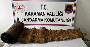 The seized Python skin with Hebrew inscription can been seen on the display at Chief Public Prosecutor's Office, Karaman, Türkiye, April 12, 2023. (AA Photo)