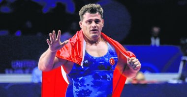 Rıza Kayaalp celebrates winning gold at the World Wrestling Championships, Belgrade, Serbia, Sept. 14, 2022. (AA Photo)