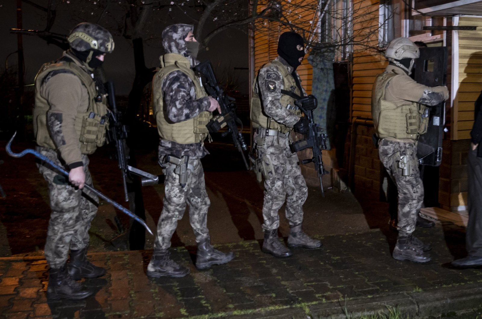 Turkish police take part in a raid in Istanbul, Türkiye, March 8, 2022. (AA Photo)