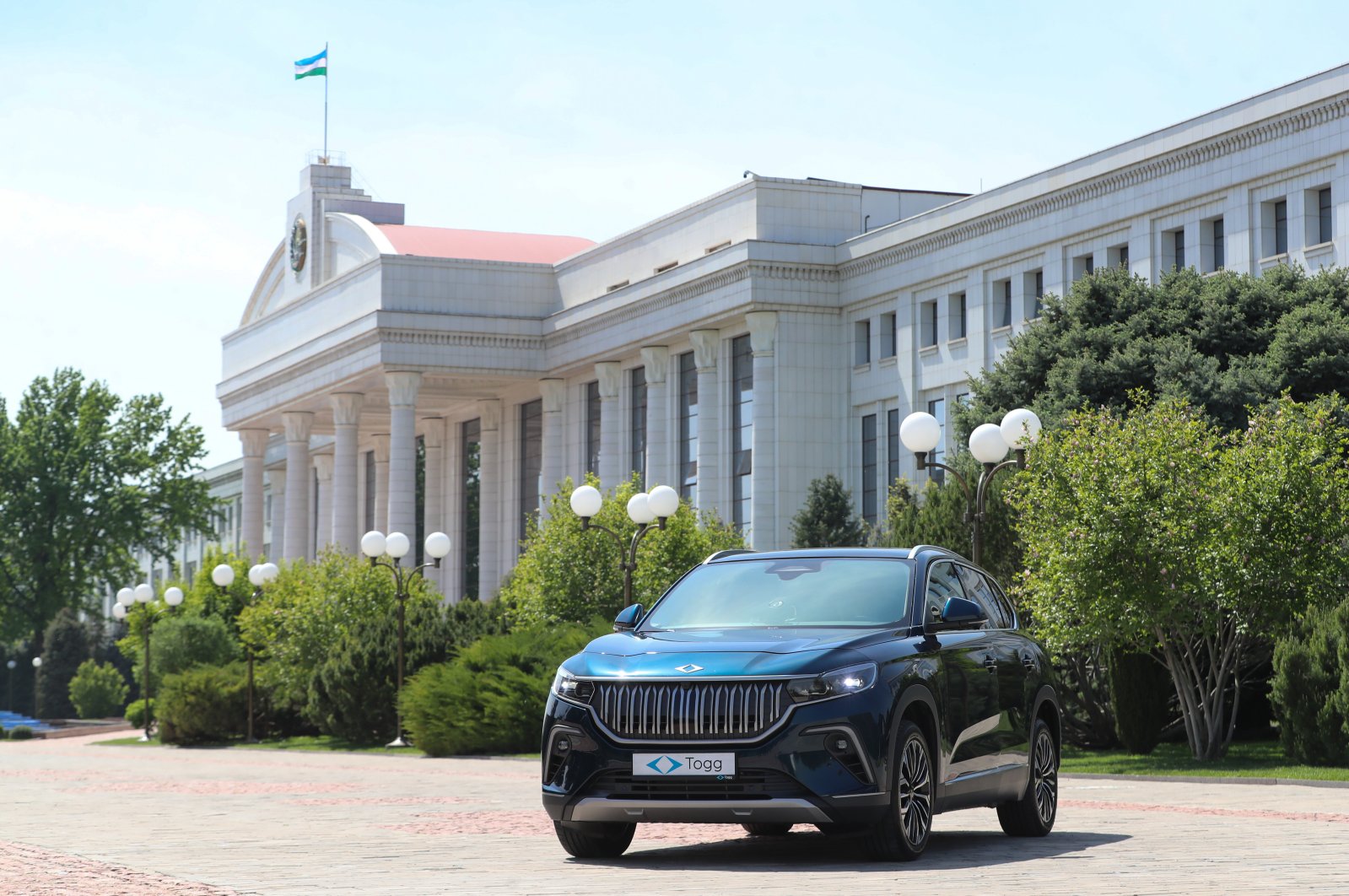 Togg seen in front of presidential palace in Tashkent, Uzbekistan, April 12, 2023. (DHA Photo)