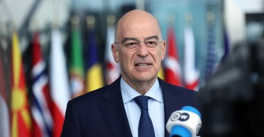 Greek Foreign Minister Nikos Dendias talks to reporters ahead of a NATO foreign ministers meeting in Brussels, Belgium, April 4, 2023. (AA Photo)