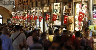 People stroll at the Grand Bazaar, known as the Covered Bazaar, Istanbul, Türkiye, Aug. 20, 2018. (AP Photo)