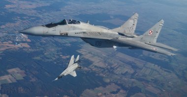 Two MiG 29 fighter jets take part in the NATO Air Shielding exercise near the air base in Lask, central Poland, Oct. 12, 2022. (AFP File Photo)
