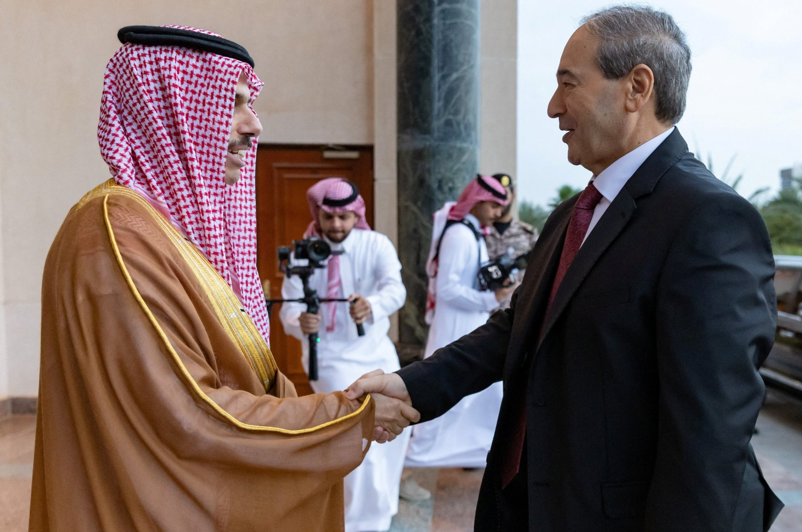 Saudi Foreign Minister Prince Faisal bin Farhan bin Abdullah Al-Saud meets with his Syrian counterpart Faisal Mekdad, Jeddah, Saudi Arabia, April 12, 2023. (Reuters Photo)